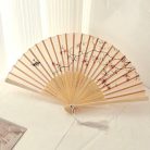 Madaras és sakurás legyező