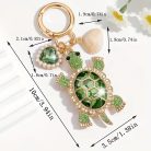 Fehér teknősös kulcstartó